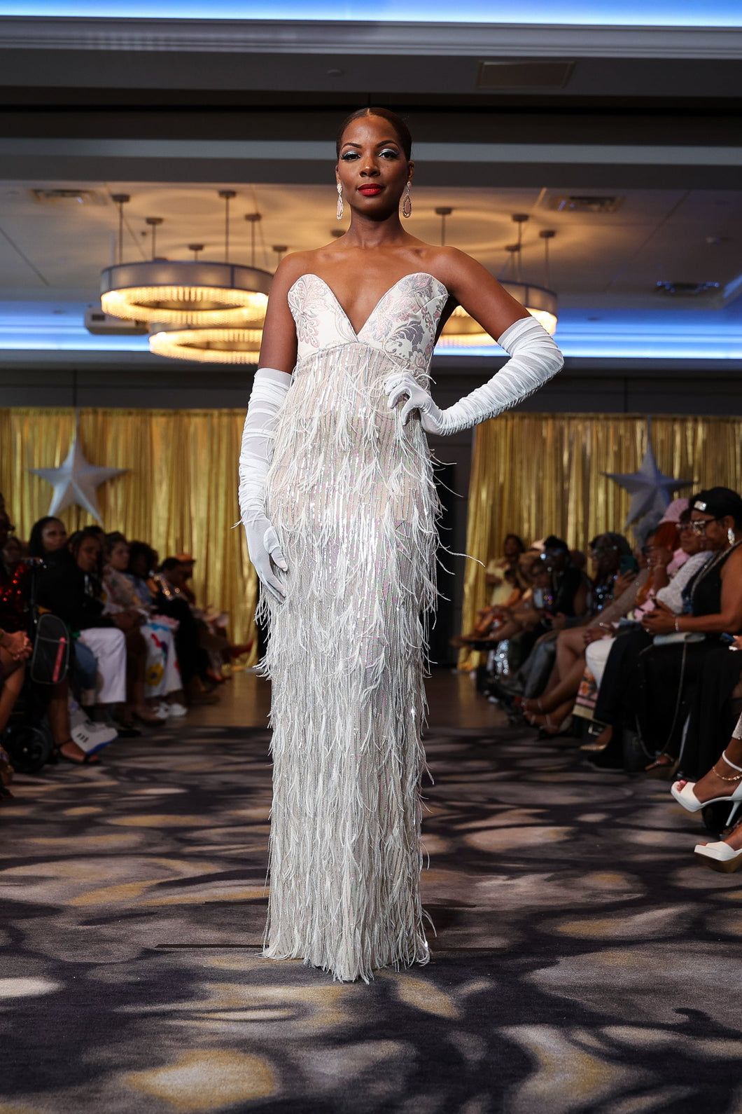 Model walking on the 2025 Anomaly Fashion Experience Runway Show, SHINE. 